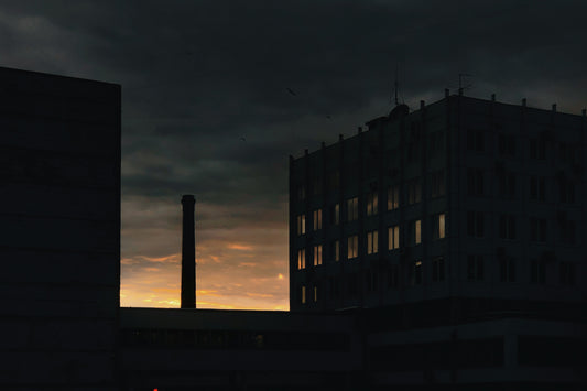 alt= Image of a building a chimney in a blackout.